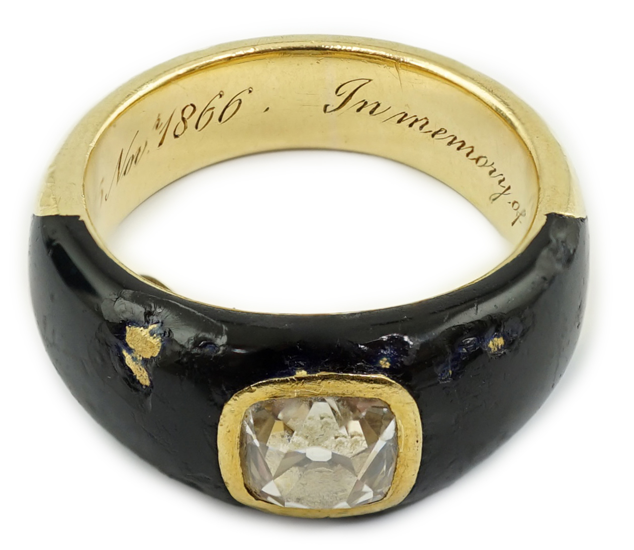 A Victorian gold, black enamel and old mine cut solitaire diamond set mourning ring